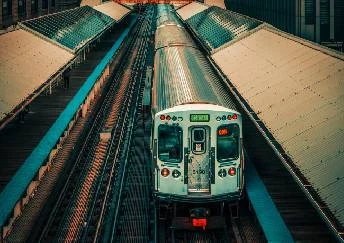 Train travelling along railway tracks